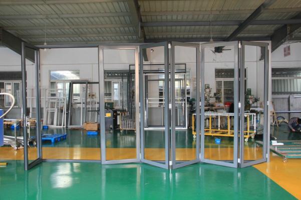 Michigan Folding Doors designs glass interior wall dividers and exterior building walls, bespoke to clients' requirement