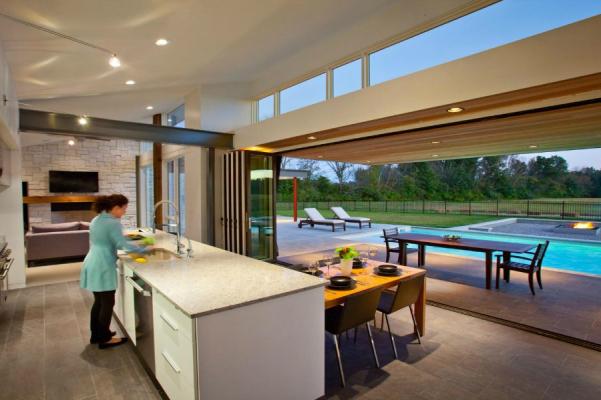 Open the all folding all glass wall system, in the kitchen, and say ahh to the outdoors and nature in Michigan!
